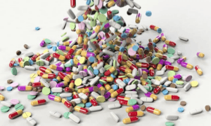 various pills cascading onto a flat surface